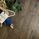 Lady reading book | Reinhold Flooring