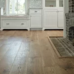 Hardwood flooring and fireplace | Reinhold Flooring